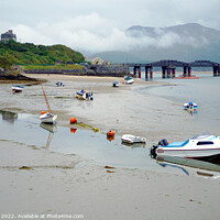 Buy canvas prints of Reflections at low tide in Barmouth, Wales. by john hill