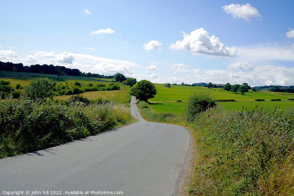 Country road in Derbyshire. Picture Board by john hill
