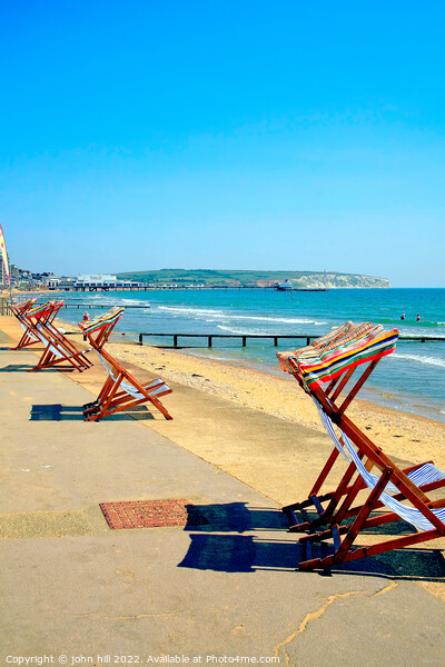 Early morning deckchairs at Sandown bay, Isle of Wight. Picture Board by john hill