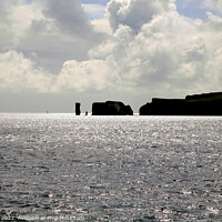 Buy canvas prints of Old Harry rock in Silhouette. by john hill