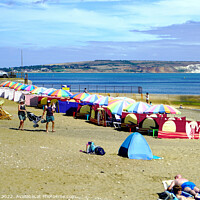 Buy canvas prints of Line of Parasols on Shanklin beach on the Isle of Wight. by john hill