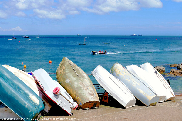 Resting rowboats at Seaview Isle of Wight. Picture Board by john hill