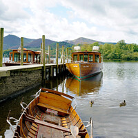 Buy canvas prints of Derwentwater jetty and North Western fells Cumbria(portrait) by john hill