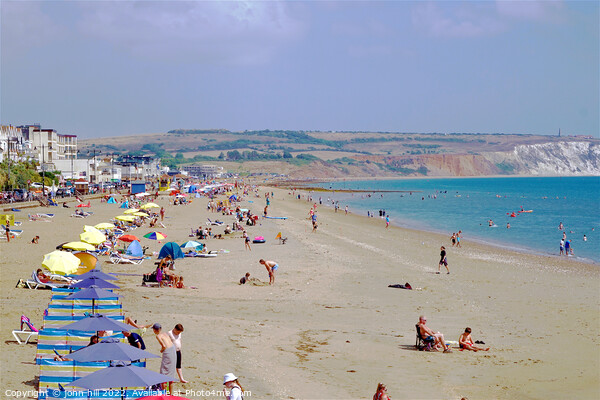 Sandown beach in August on the Isle of Wight. Picture Board by john hill