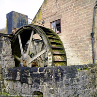 Buy canvas prints of Old water wheel at Cromford, Derbyshire by john hill