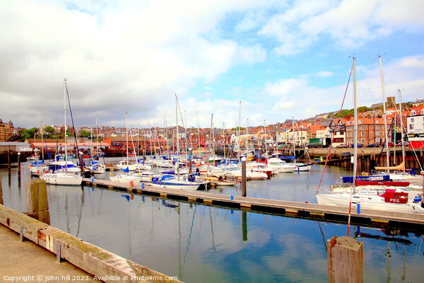 Scarborough harbour reflections, North Yorkshire. Picture Board by john hill