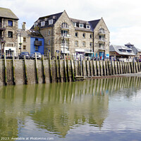 Buy canvas prints of Reflections at Looe quay Cornwall by john hill