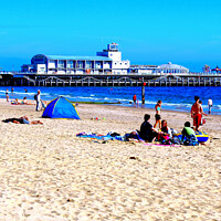Buy canvas prints of Sunshine and Fun at Bournemouth Pier by john hill