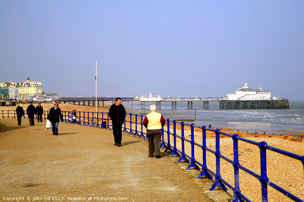 Serene Stroll along Eastbourne's Iconic Coastline Picture Board by john hill