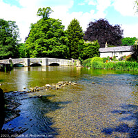 Buy canvas prints of Ashford's Quaint Packhorse Bridge Over River Wye by john hill