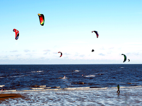 Harnessing Coastal Breezes: Kite Surfers at Norfol Picture Board by john hill