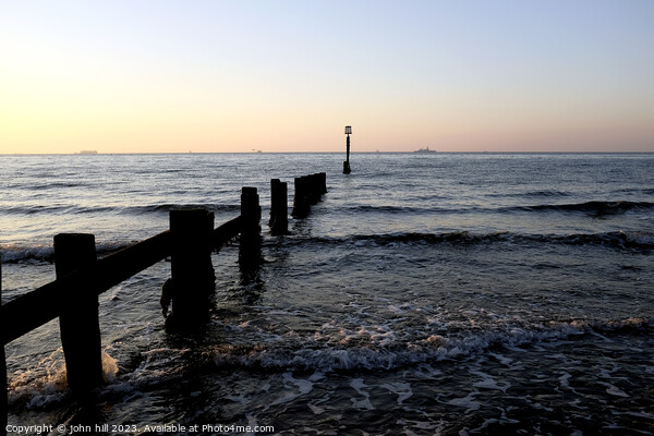 Groyne dawn at Sandown bay, Isle of Wight. Picture Board by john hill