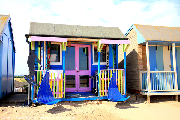 Colorful beach hut Picture Board by john hill