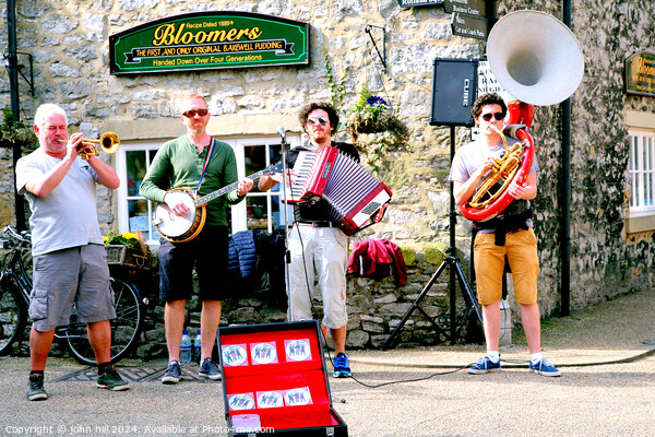Busking at Bakewell, Derbyshire. Picture Board by john hill