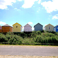 Buy canvas prints of Silhouetted beach huts at Chapel point. by john hill