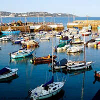Buy canvas prints of Evening view of Paignton harbour and Torbay. by john hill