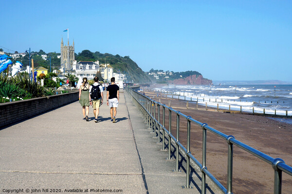 Walking the promenade at Teignmouth Devon. Picture Board by john hill