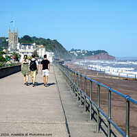 Buy canvas prints of Walking the promenade at Teignmouth Devon. by john hill