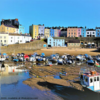 Buy canvas prints of The beautiful colorful harbour of Tenby Wales at low tide. by john hill