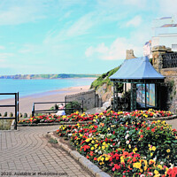 Buy canvas prints of The colorful Esplanade gardens at Tenby Wales.  by john hill