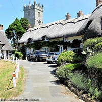 Buy canvas prints of Thatched cottages at church hill at Godshill Isle of Wight  by john hill