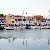Buy canvas prints of Yachts and reflections by the quay at Weymouth in Dorset. by john hill