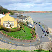 Buy canvas prints of Crescent hill looking towards the Brigg at Filey in Yorkshire.  by john hill