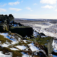 Buy canvas prints of Stanage edge in Winter at Derbyshire. by john hill