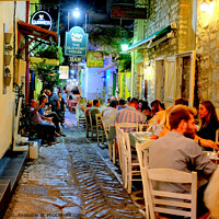 Buy canvas prints of Skiathos town Nightlife Greece. by john hill