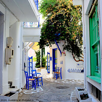 Buy canvas prints of Back street in Skiathos town Greece. by john hill