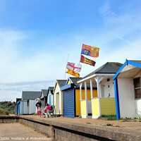 Buy canvas prints of Beach hut flying the royal standard at Chapel point in Lincolnshire.  by john hill