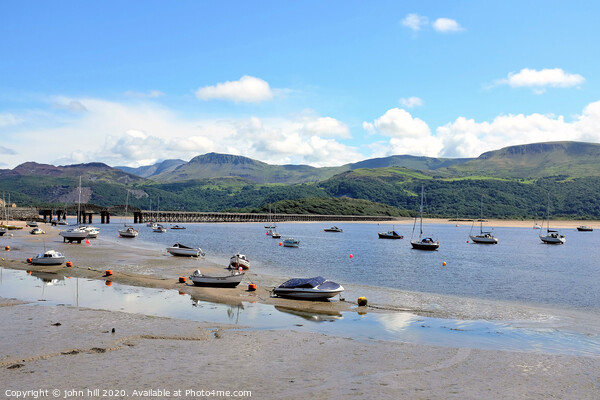 Cader Idris  mountains and Barmouth railway bridge at Barmouth in Wales. Picture Board by john hill