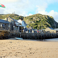 Buy canvas prints of The harbour quay at Barmouth in Wales.  by john hill