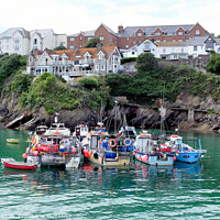 Buy canvas prints of Fishing boats moored in the harbour at Newquay in Cornwall. by john hill