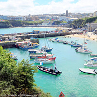 Buy canvas prints of Harbour beach and Towan beach during High tide at Newquay in Cornwall. by john hill