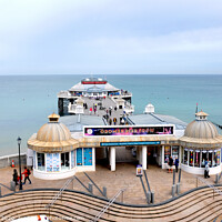 Buy canvas prints of Cromer pier from the front at Cromer in Norfolk.  by john hill