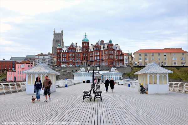 The boardwalk and town from the pier at Cromer in Norfolk.  Picture Board by john hill