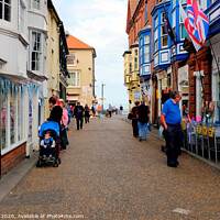 Buy canvas prints of The High street at Cromer in Norfolk. by john hill