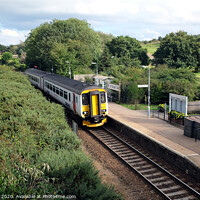 Buy canvas prints of Countryside village Railway station at West Runton in Norfolk. by john hill
