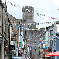 Buy canvas prints of Flags and bunting at Caernarfon in Wales. by john hill