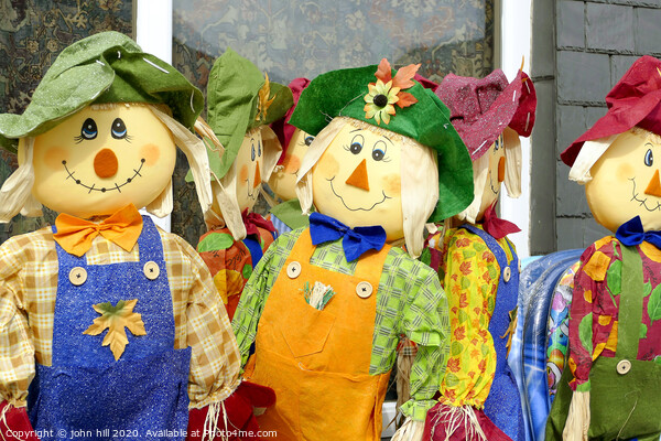 Homemade Scarecrows for sale outside a shop at Porthmadog in Wales.  Picture Board by john hill