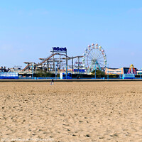 Buy canvas prints of Seaside funfair from the beach at Skegness in Lincolnshire. by john hill