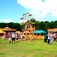 Buy canvas prints of Countryside funfair at Tansley in Derbyshire. by john hill