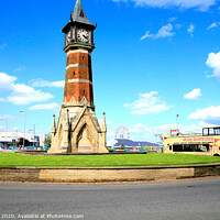 Buy canvas prints of The landmark clock tower against a blue sky at Skegness in Lincolnshire. by john hill