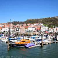 Buy canvas prints of The Marina town and castle at Scarborough in Yorkshire. by john hill