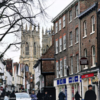 Buy canvas prints of Low Petergate and cathedral towers at York in Yorkshire. by john hill
