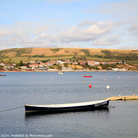 Buy canvas prints of Swanage town from across the bay at Swanage in Dorset. by john hill