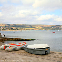 Buy canvas prints of View of Swanage bay during October in Dorset.  by john hill