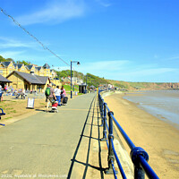 Buy canvas prints of Promenade looking towards the Brigg at Filey in Yorkshire. by john hill