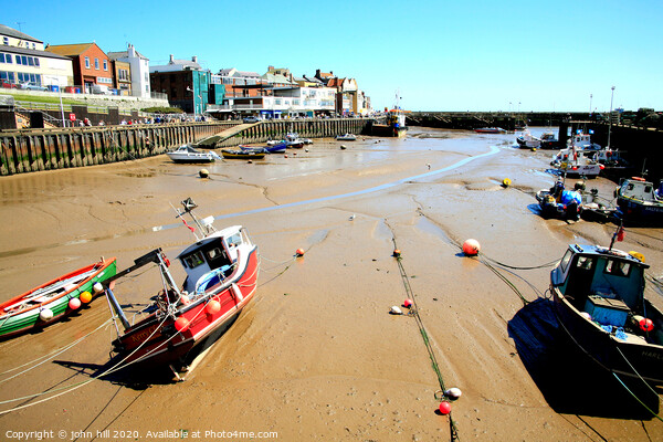 Harbour and quay during low tide at Bridlington in Yorkshire. Picture Board by john hill